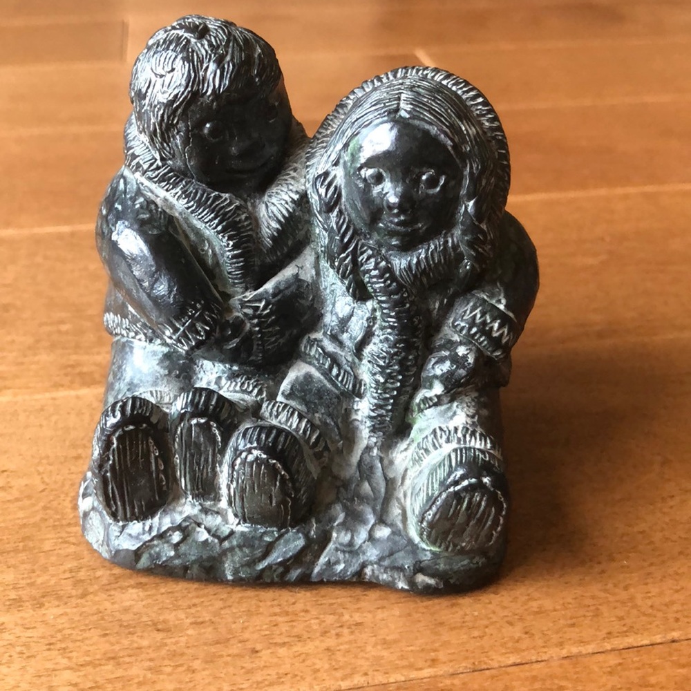Soapstone sculpture of 2 children